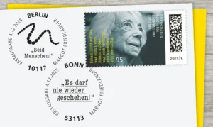 Briefmarke und Poststempel zur Ehrung von Margot Friedländer